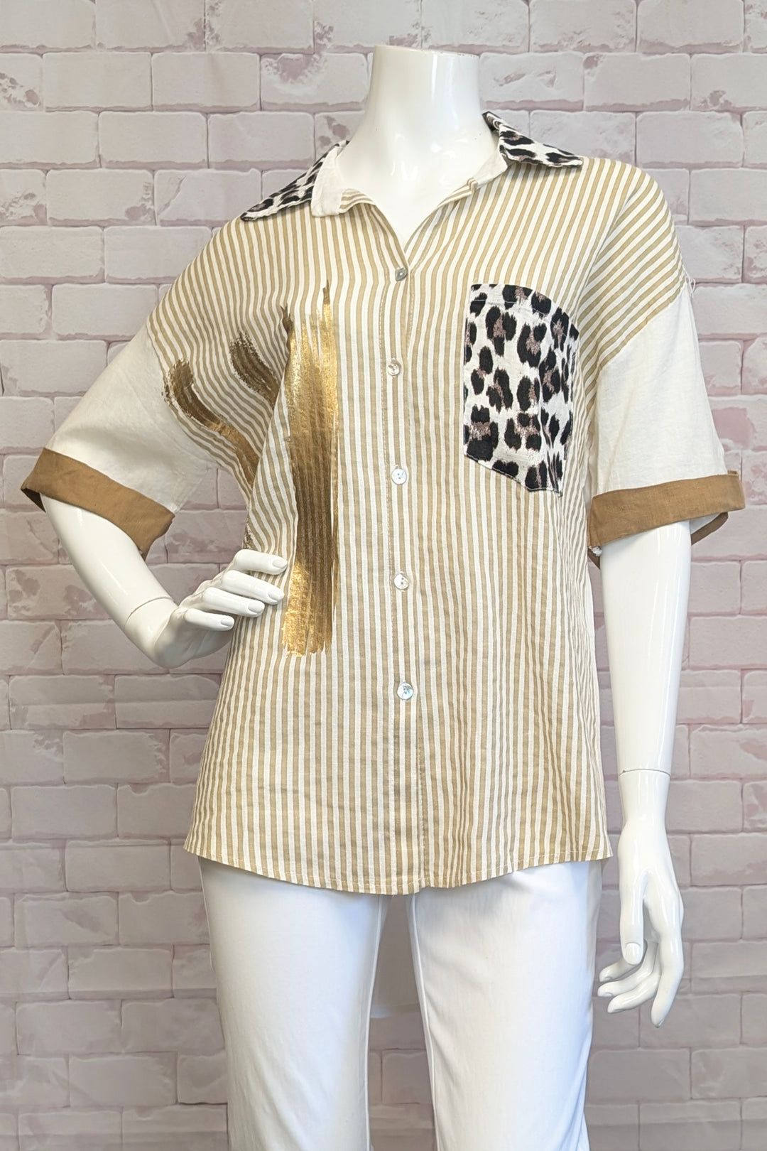 ETERN Spring 2025 The gold trim cuffs add a touch of elegance, while the contrast collar and stitch chest pocket give it a unique edge. Plus, the short roll-up sleeves are perfect for warmer weather.