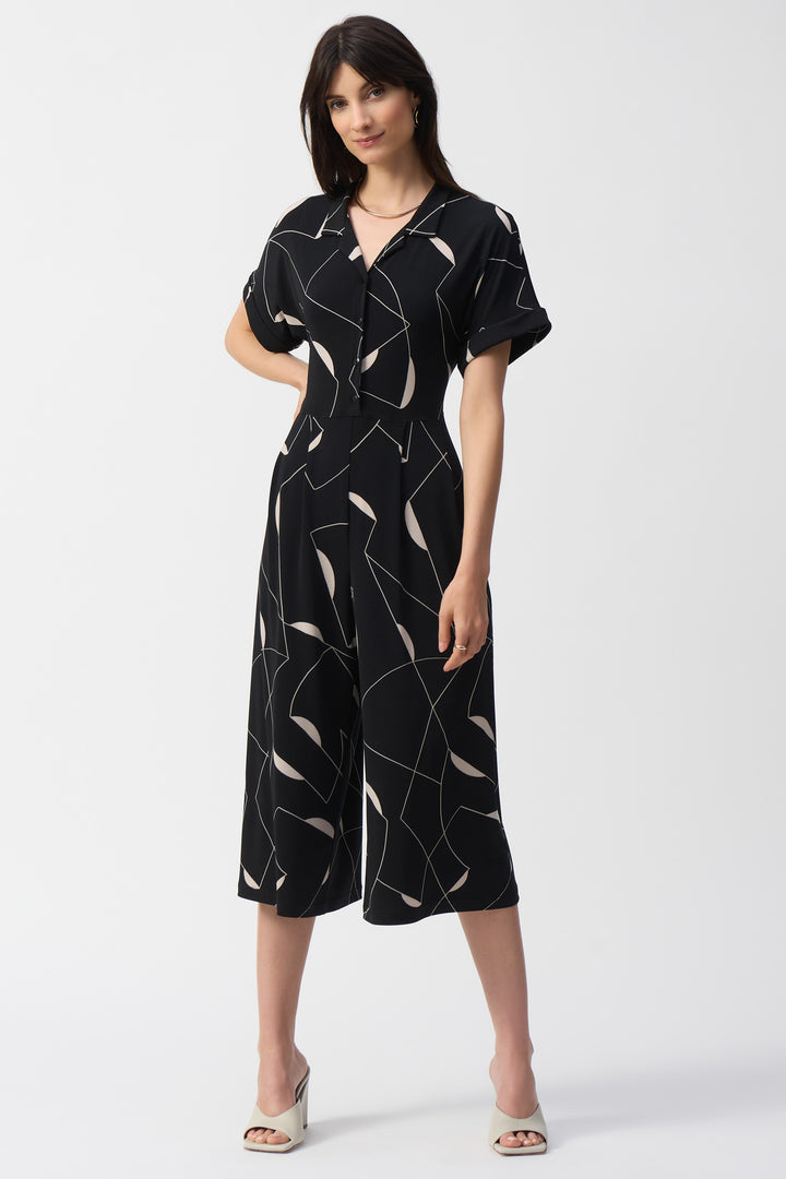 Joseph Ribkoff Spring 2025  This vintage-inspired jumpsuit features a v-neckline with short sleeves and wide legs that create a beautiful, relaxed silhouette. 