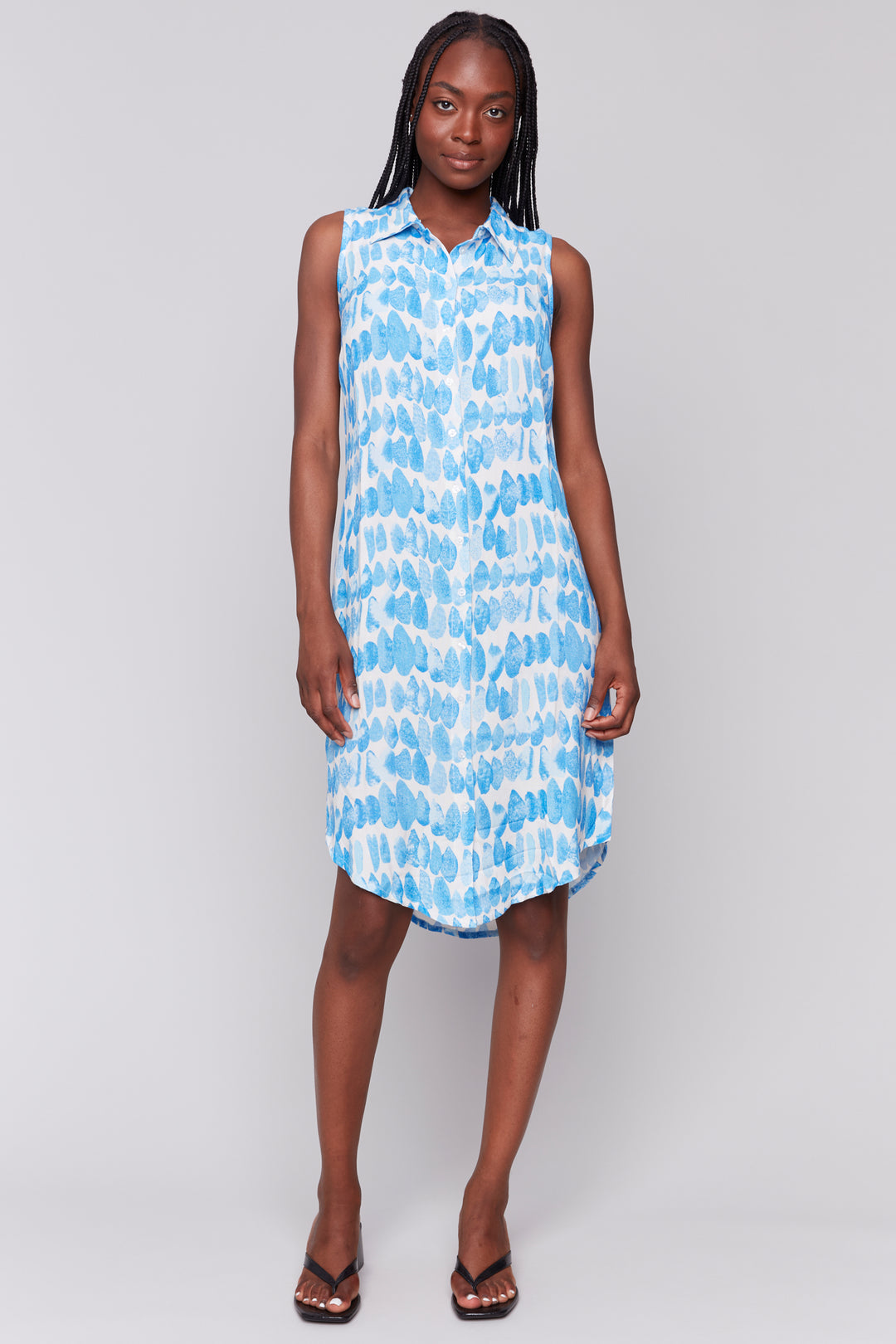 Charlie B Spring 2025  This versatile dress features a sleeveless design and a beautiful blue drops print, perfect for any occasion. 