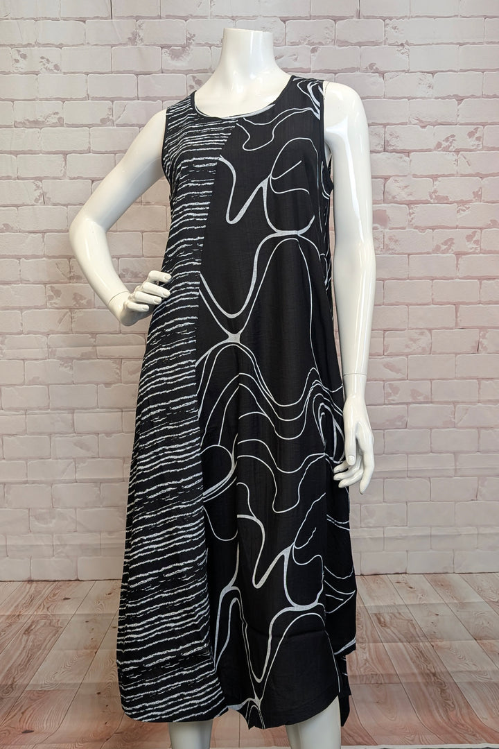 VARIATIONS Spring 2025 Crafted with soft fabrics, this sleeveless dress with round neck is sure to keep you cool and comfortable on warmer days.