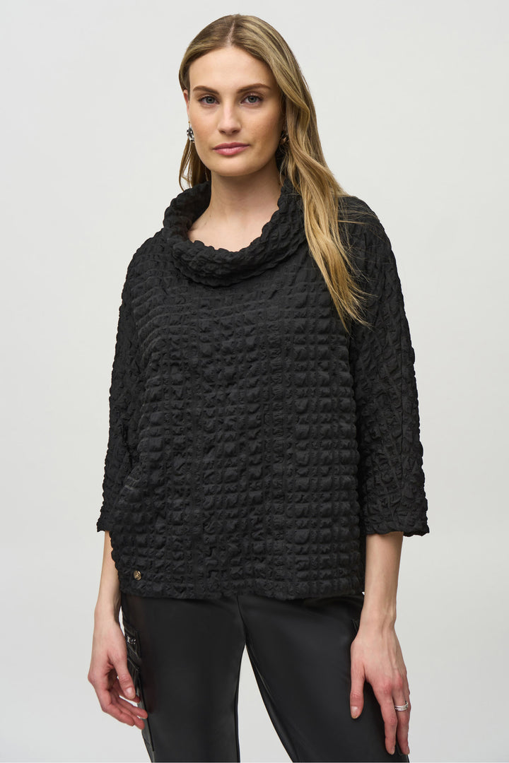 Joseph Ribkoff Fall 2024  The unique textured design adds depth and dimension, while the cowl neck and 3/4 length sleeves provide comfort and style. 