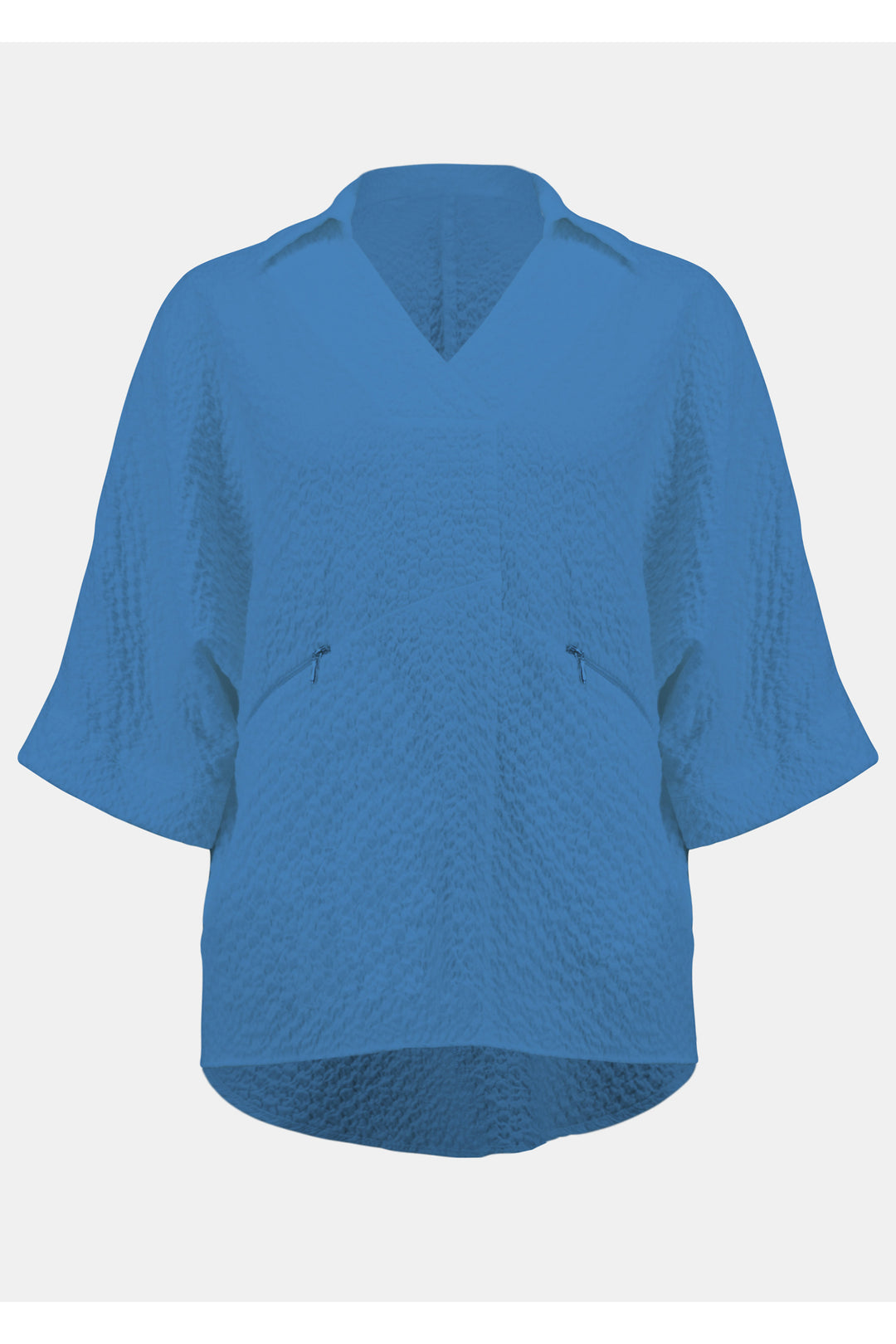Joseph Ribkoff Spring 2025  Made from lightweight and breathable seersucker fabric, this top features front pockets and a unique texture design. Its short drop sleeves and loose fit make it perfect for any occasion- from casual to chic. 