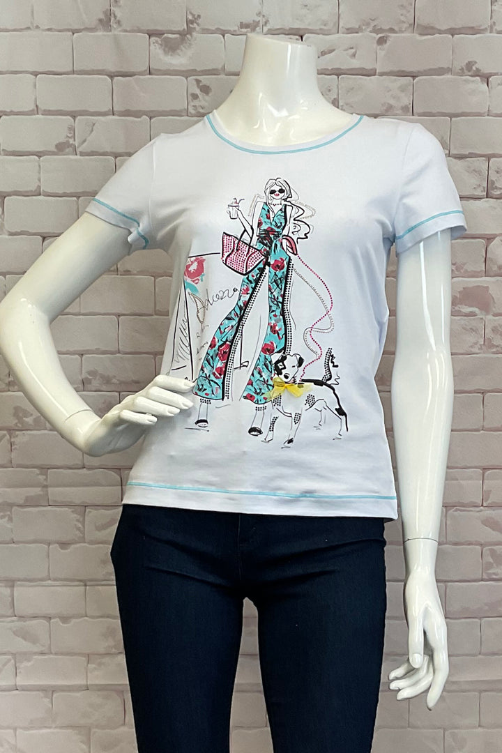 Dolcezza Spring 2025  Made with stretchy cotton fabric, this tee features contrast stitching along the hem, cuffs and neckline for added flair. The unique print design of a girl with her cute dog will surely make a statement! 