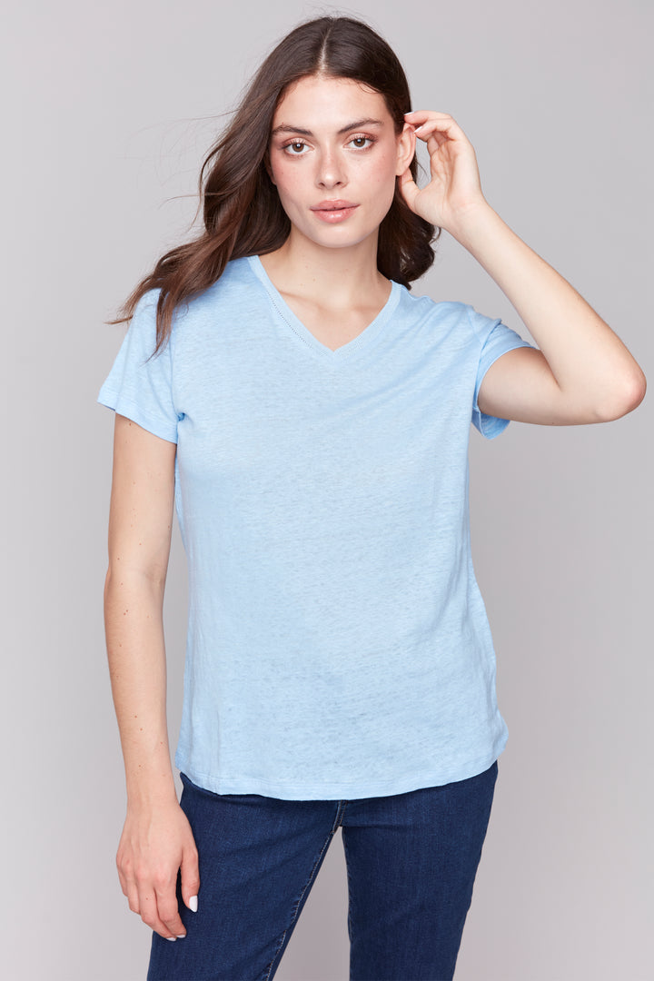 Charlie B Spring 2025 The simple yet neat design makes it versatile and perfect for any casual occasion. The jersey knit fabric, short sleeves and v-neck design make it light and comfortable.