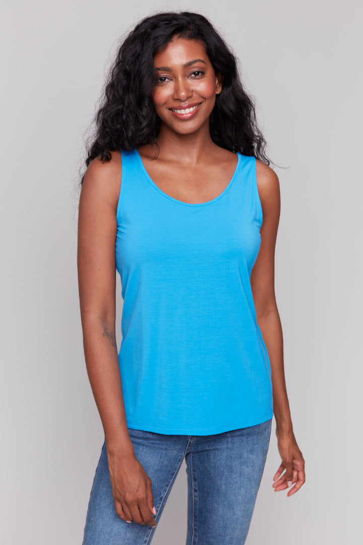 Charlie B Spring 2025 Featuring a reversible design and a light and simple style, this top is perfect for any summer occasion. Comfortable and versatile, it's a must-have addition to your wardrobe!