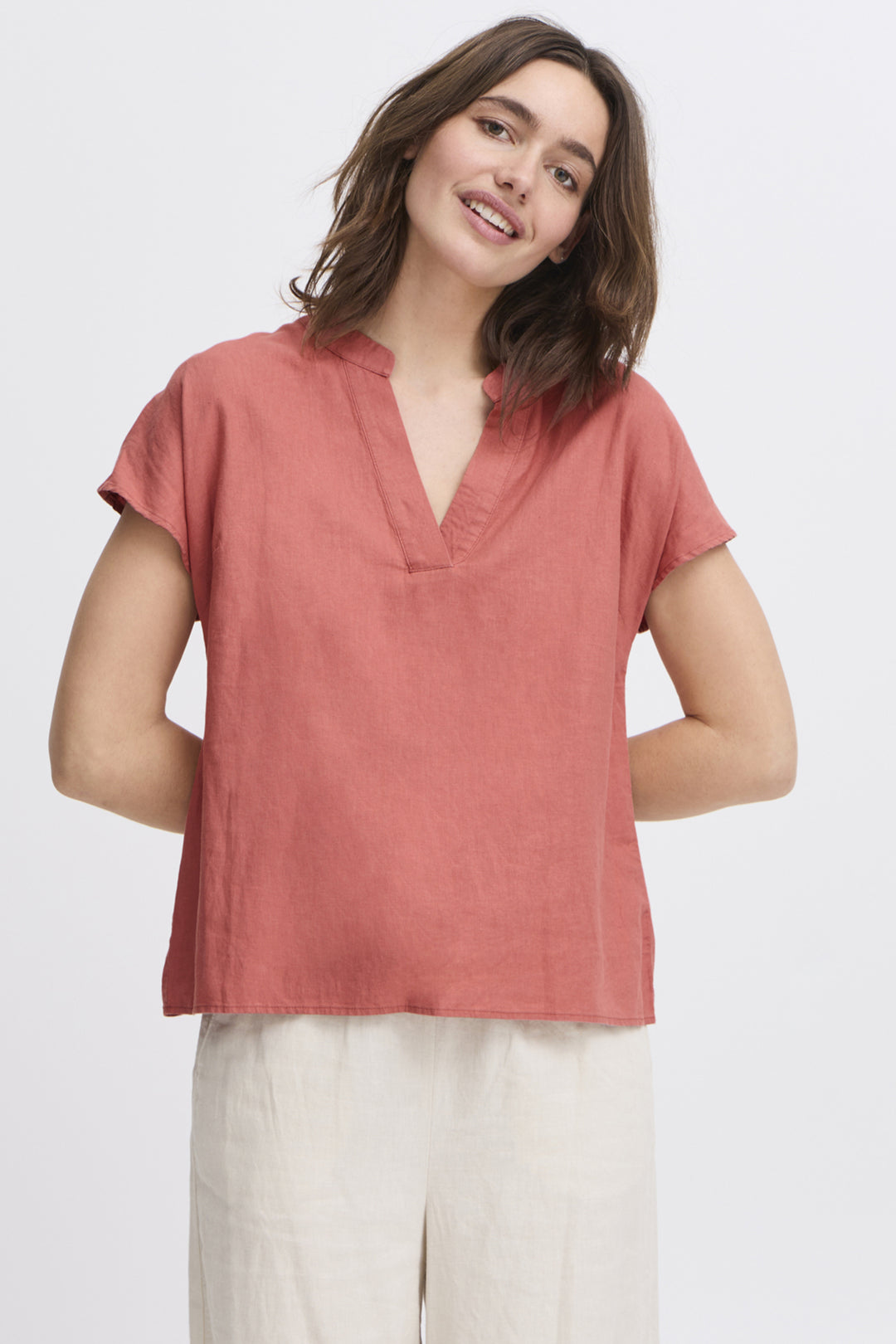 B.YOUNG Spring 2025  With cap short sleeves and a split v-neck, this top offers style and comfort in one simple design. 