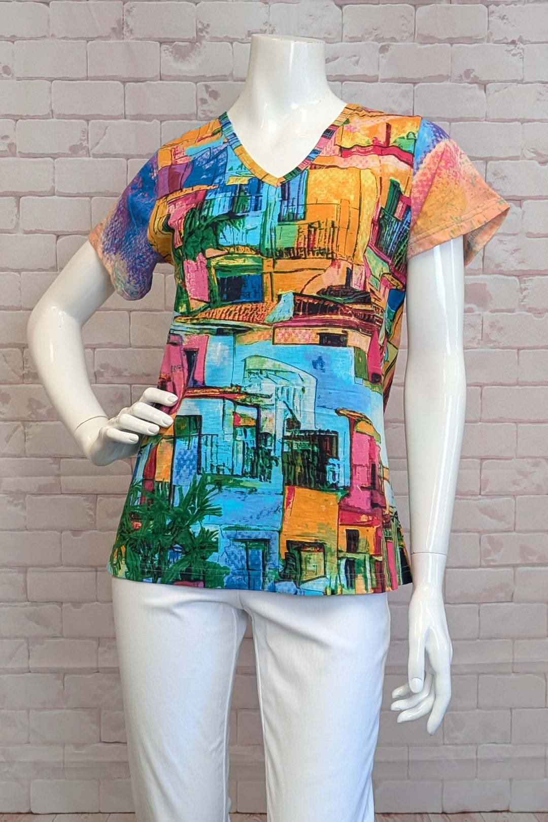 ORIENTIQUE Spring 2025 Made with all organic cotton, this tee offers a breezy and casual look while being super comfortable in its soft, stretch fabric.