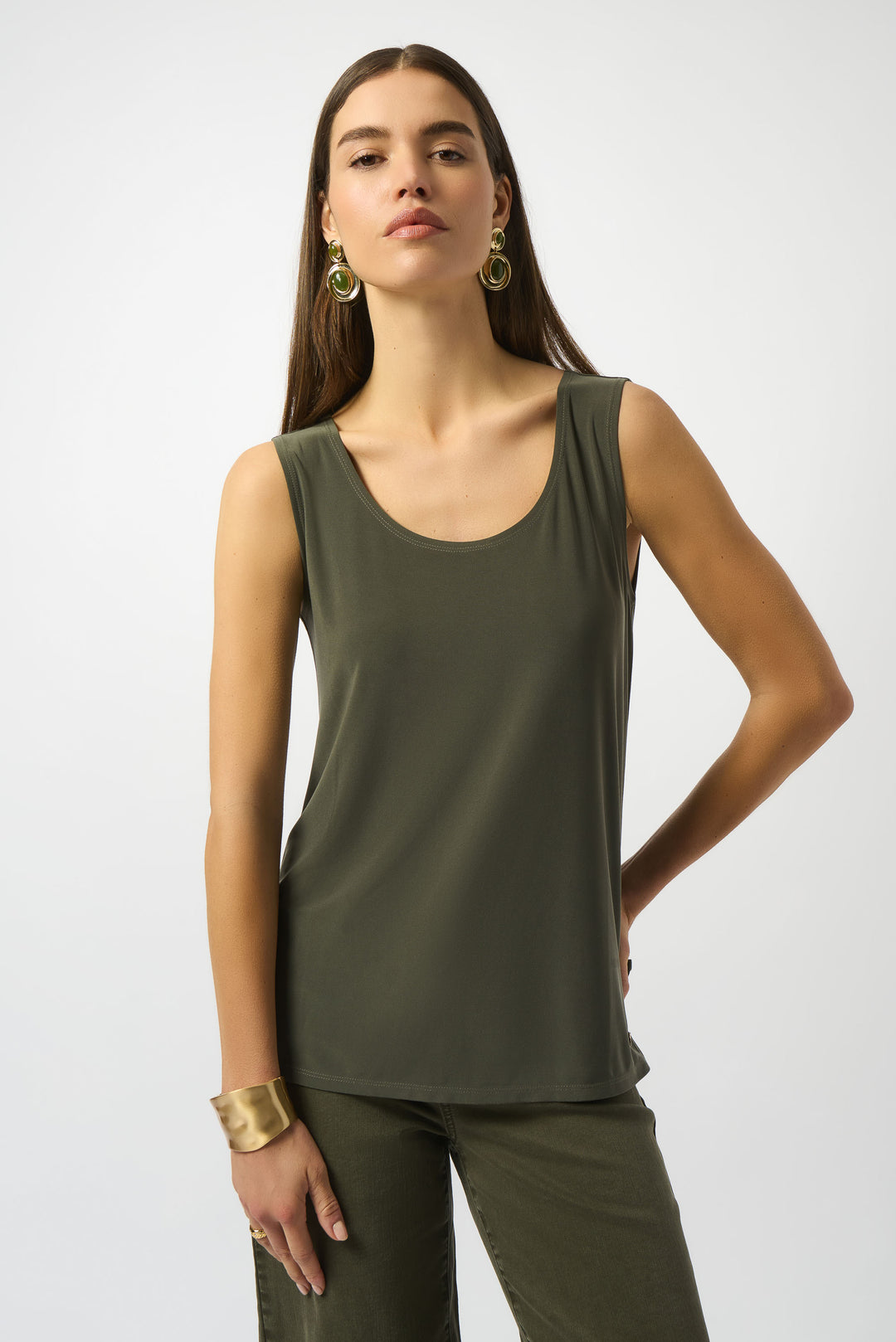 JOSEPH RIBKOFF Fall 2025 The luxurious silky knit fabric pairs well with a jean jacket or cardigan, making it an ideal choice for layering. Stay cool and stylish all day long with this versatile tank top.