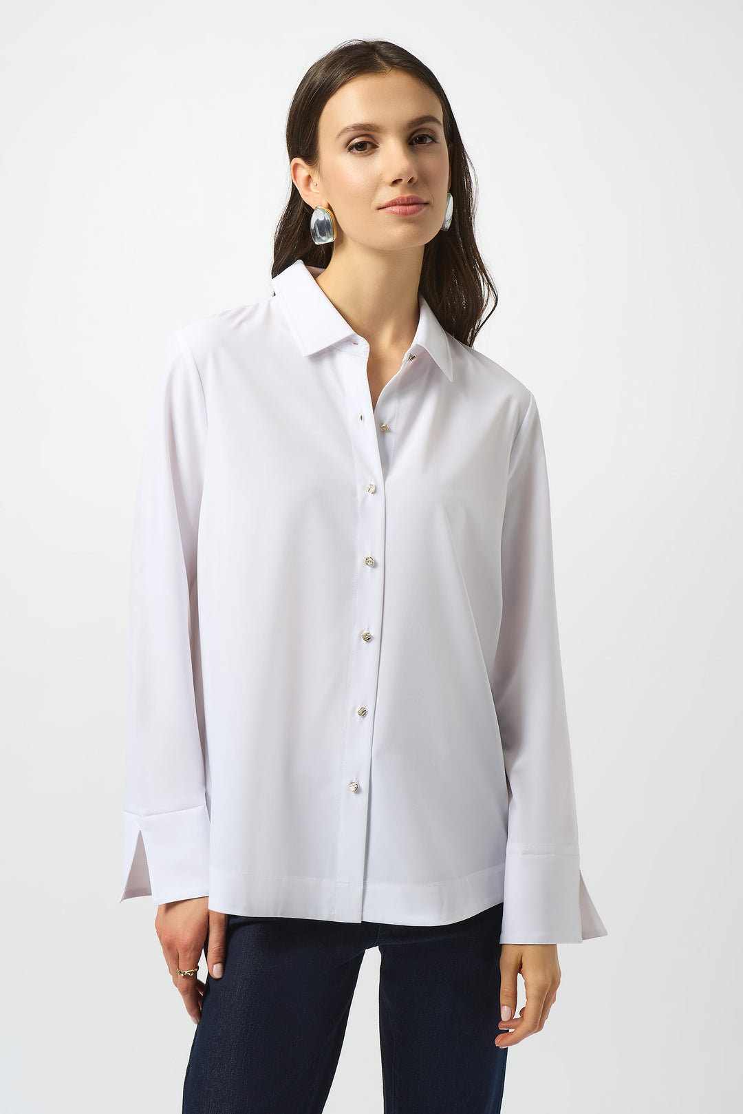 JOSEPH RIBKOFF Fall 2025 Featuring a classic collar, slit cuff details and front contrast buttons, this blouse exudes sophistication.