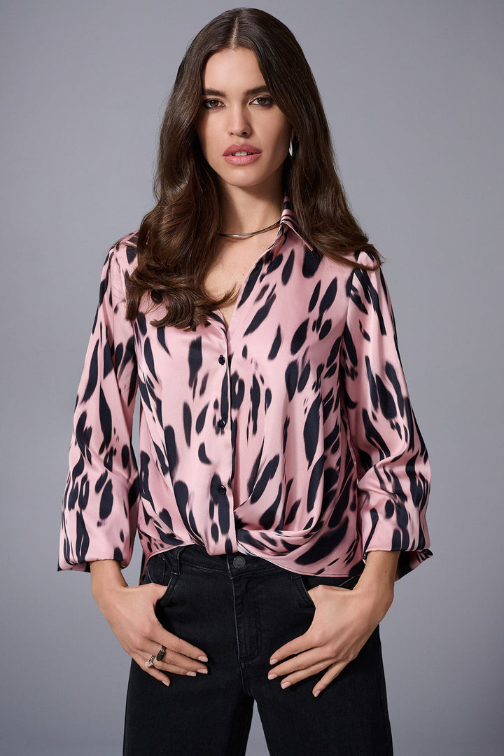JOSEPH RIBKOFF Fall 2025 
This silky blouse features full-length puffy sleeves and a luxurious woven satin fabric that feels smooth against your skin. The eye-catching animal print covers the entire piece, while a front twist knot at the hem adds a neat touch.