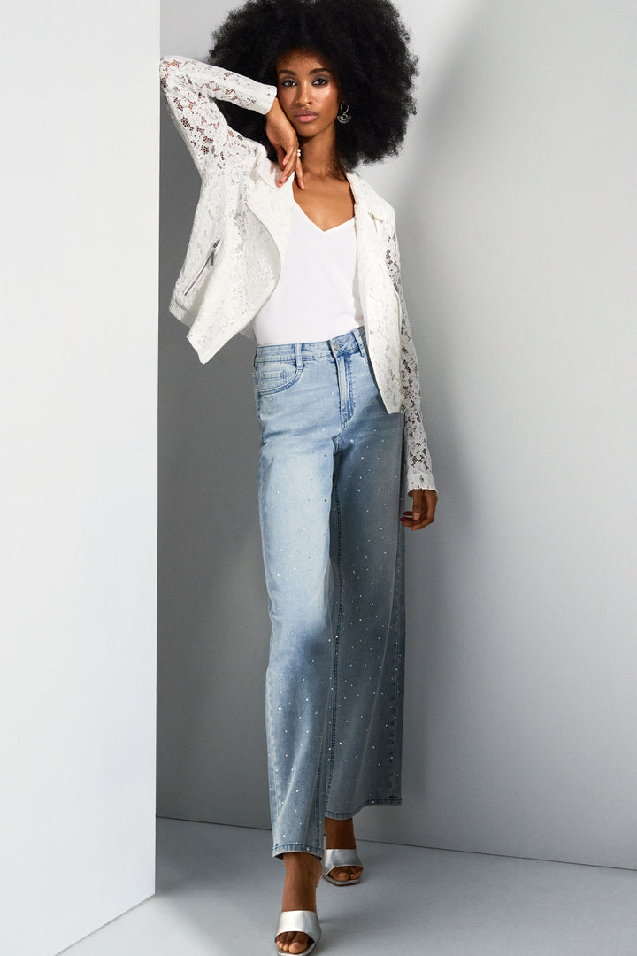 Joseph Ribkoff Spring 2025 Wide leg jeans are back in style, with crystals it brings all the flare of the 70s into the present! 