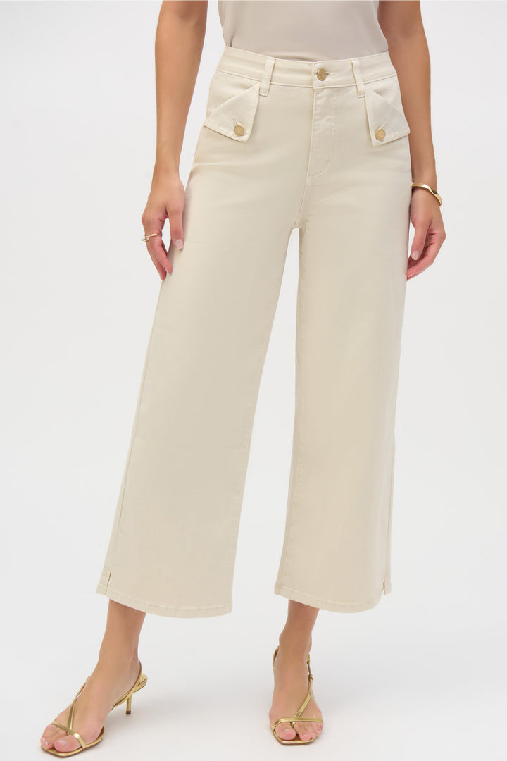 Joseph Ribkoff Spring 2025  Made with super soft denim, these wide-leg jeans offer both comfort and style. The 5-pocket design and stretch fabric make them versatile for any occasion. 