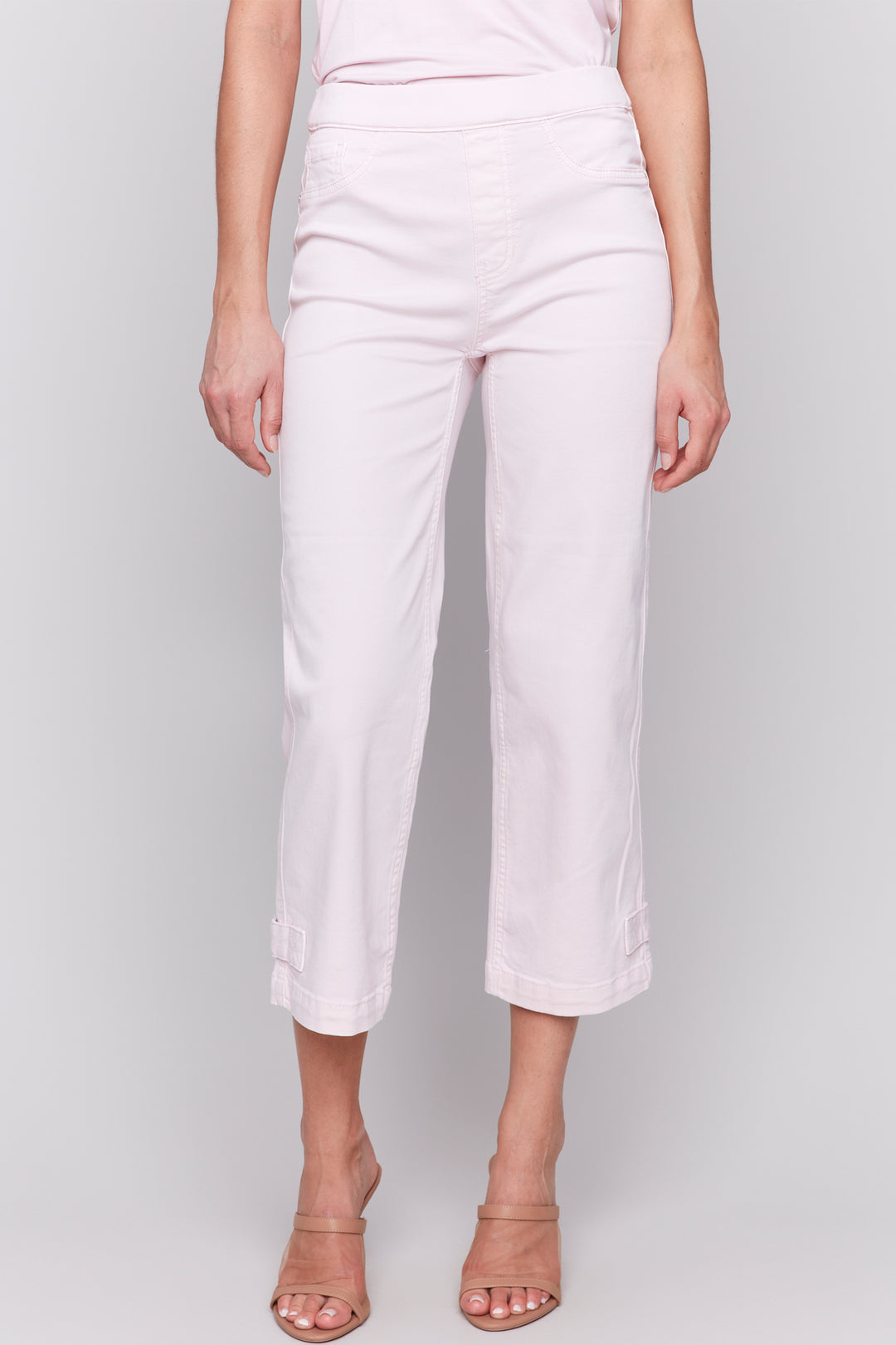 Charlie B Spring 2025 With a nice stretch and a lovely light spring colour, they are the perfect addition to your wardrobe! The cropped length and pull-on waist make for easy wear, while the addition of a button tab hem adds a touch of sophistication.