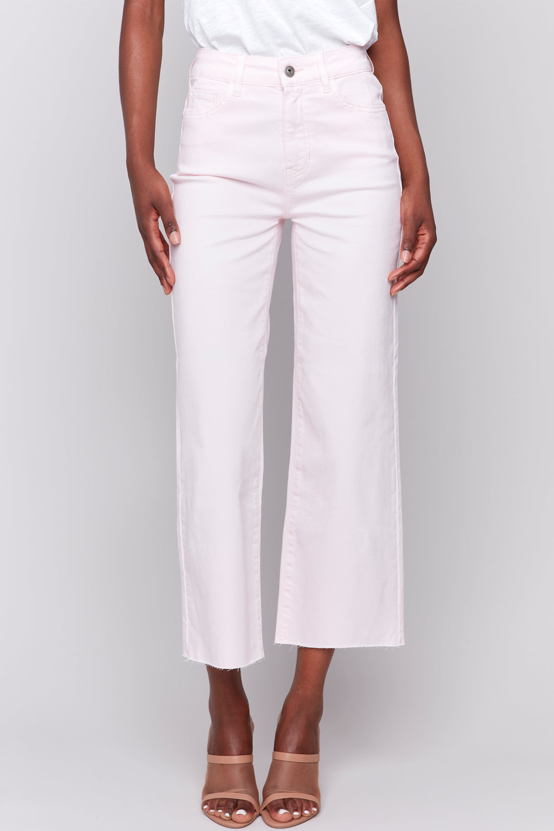 Charlie B Spring 2025 Every closet needs a variety of jeans that add a stylish finishing touch to any outfit and these cool raw hem jeans by Charlie B make a great upgrade to a wardrobe staple! They feature a bootcut, mid-rise, moderate stretch, raw cut hems and five pocket design.