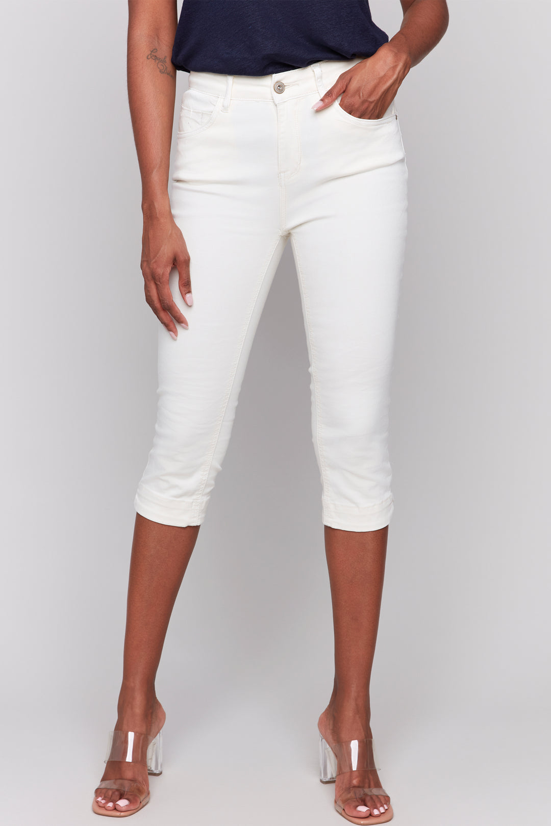 Charlie B Spring 2025 Featuring a classic 5 pocket design, these cropped slim leg cotton jeans can be dressed up or down for a casual look that is anything but ordinary.