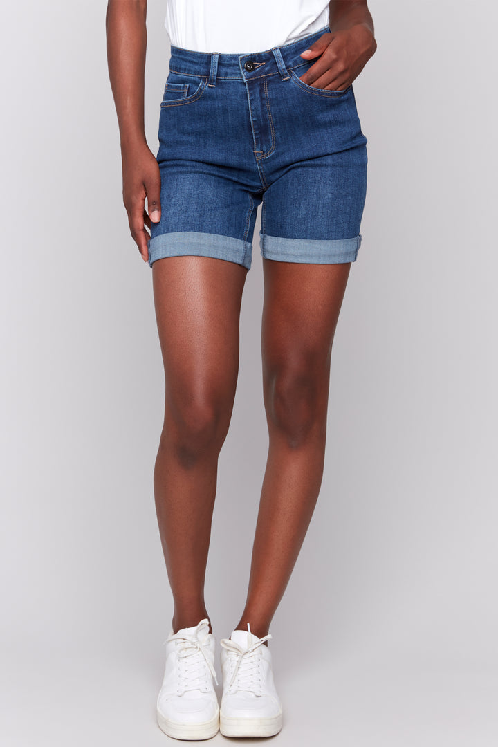 Charlie B Spring 2025 Made from solid stretch twill fabric, these comfy cotton shorts feature smart cuffed hems for a polished look. The slim fit offers a flattering silhouette.