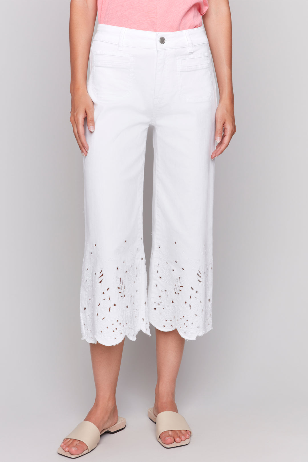 Charlie B Spring 2025  The frayed scallop embroidered hem adds a playful touch to these classic wide-leg jeans, while the zipper fly & belt loops provide the perfect fit. 