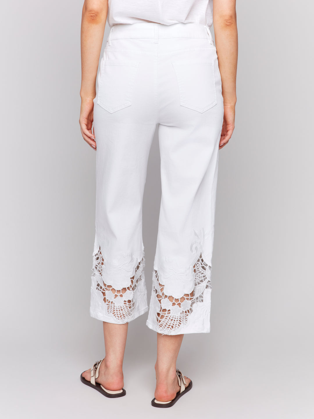 WHITE CROP JEAN WITH FLORAL LACE HEM
