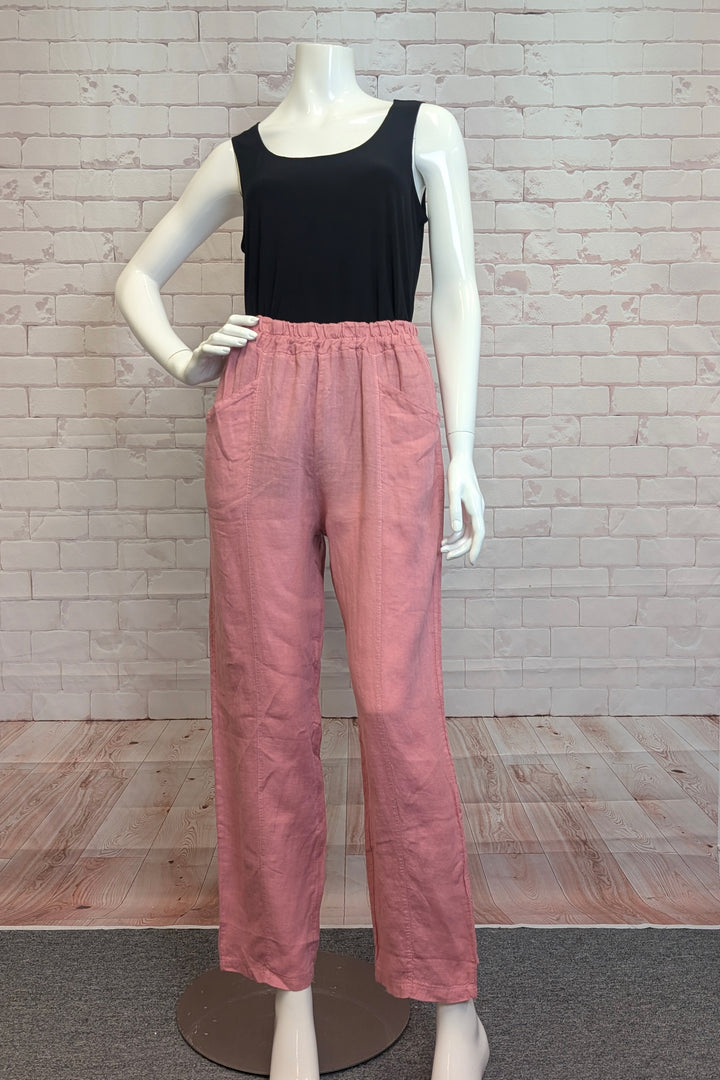 M ITALY Spring 2025 Expertly designed with an elastic waistband for all-day comfort, these slightly cropped pants feature two practical front pockets. Their minimalist aesthetic offers versatile styling options, making them an essential wardrobe staple.