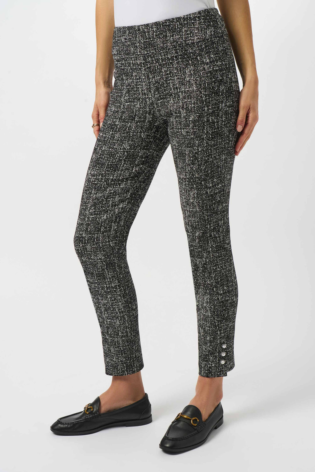 Joseph Ribkoff Fall 2025  The elastic waistband ensures a comfortable and flattering mid-rise fit, while the tweed knit fabric adds texture and depth. Perfect for any occasion, dress them up or down for the perfect balance of comfort and style, day or night! 