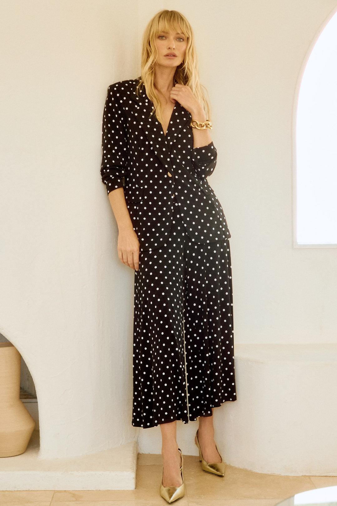 Joseph Ribkoff Summer 2025  These free flowing pants feature a neat polka dot print making them a perfect choice for a holiday or a cozy summer day at home. 