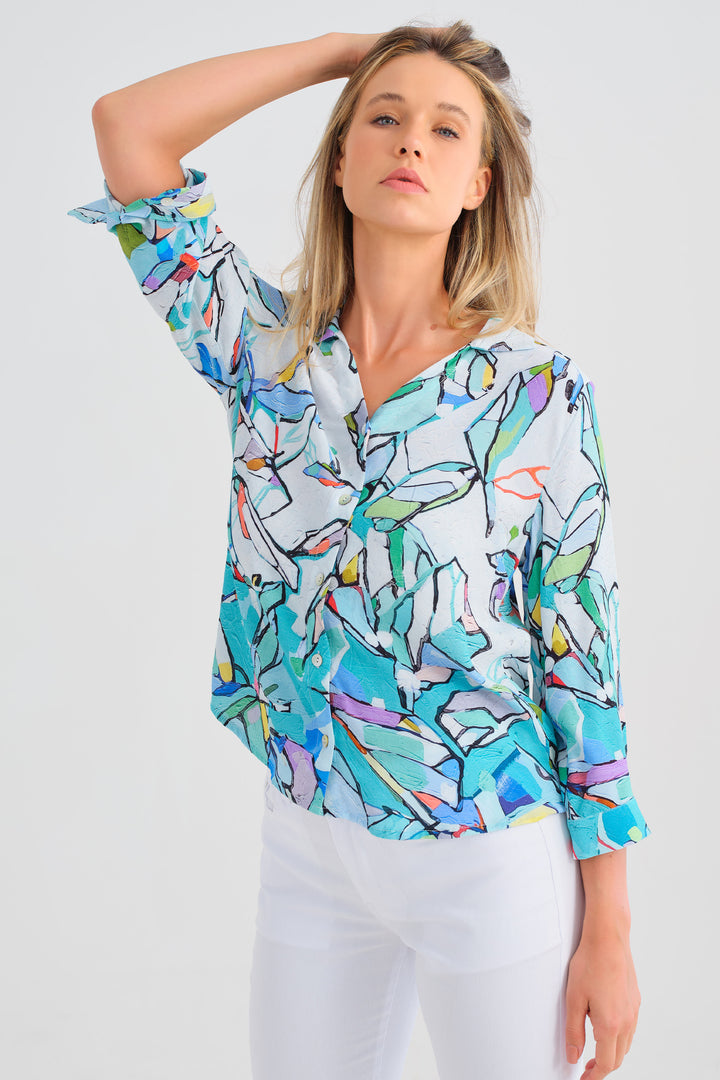 Dolcezza Spring 2025  From cool nights to warmer days this floral spring and Easter blouse is a fresh take on a classic favourite. The light and soft fabric harmonizes with the classic collar, pearl buttons and with the 3/4 length straight sleeves keeps the look cool and casual. 