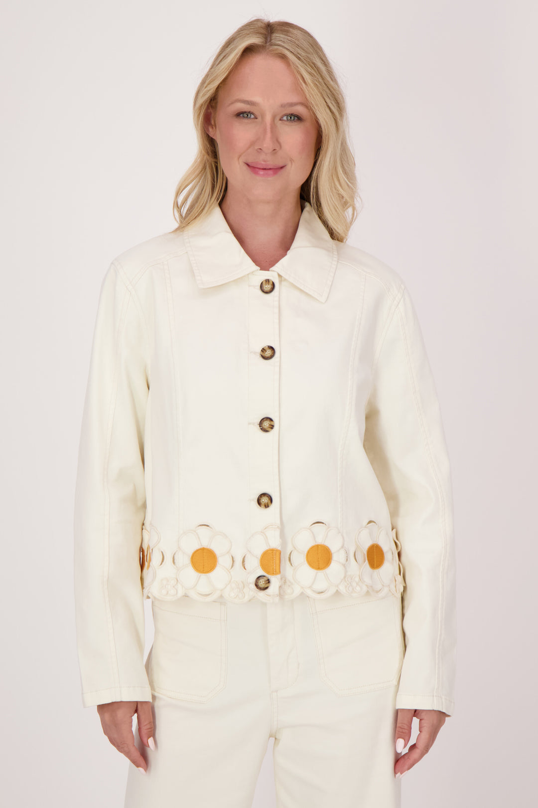 GABBY ISABELLA Spring 2025  The charming daisy flower detail at the hem adds a unique, playful touch that sets it apart. Designed with a classic fit and front button closure, it offers both comfort and style, making it a versatile addition to your wardrobe. 