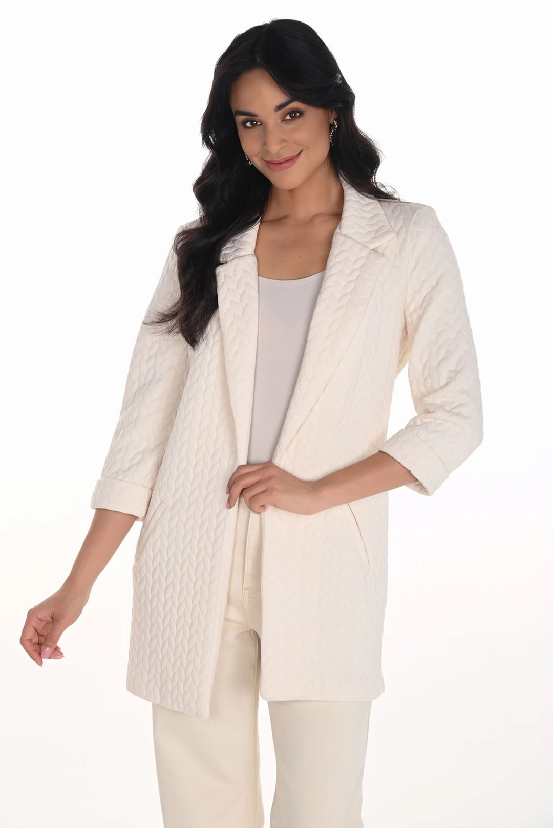 Frank Lyman Fall 2025 
Featuring a refined notch lapel collar and tailored 3/4 length straight sleeves, this cream vanilla piece is perfect for both business settings and smart casual occasions. Its texture design adds understated elegance, making it a versatile choice for modern office wear or polished weekend looks.