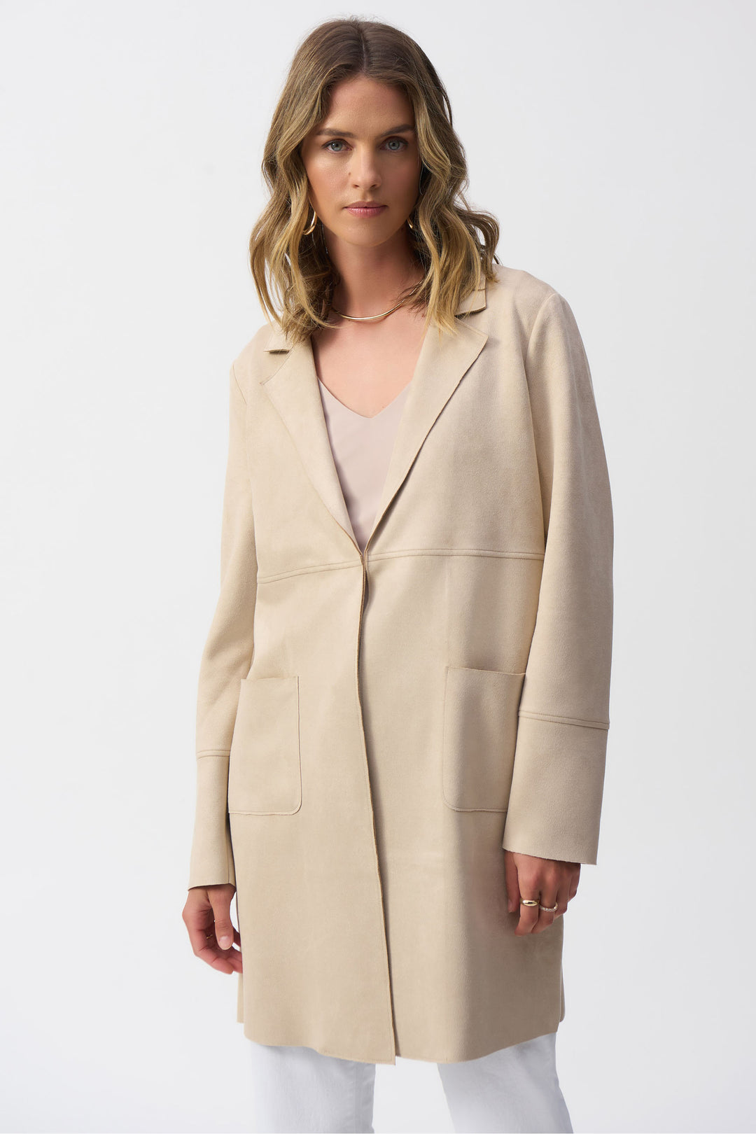 Joseph Ribkoff Spring 2025 This open style mid length overcoat features front pockets and a soft blend of fabrics for a light and loose feel.