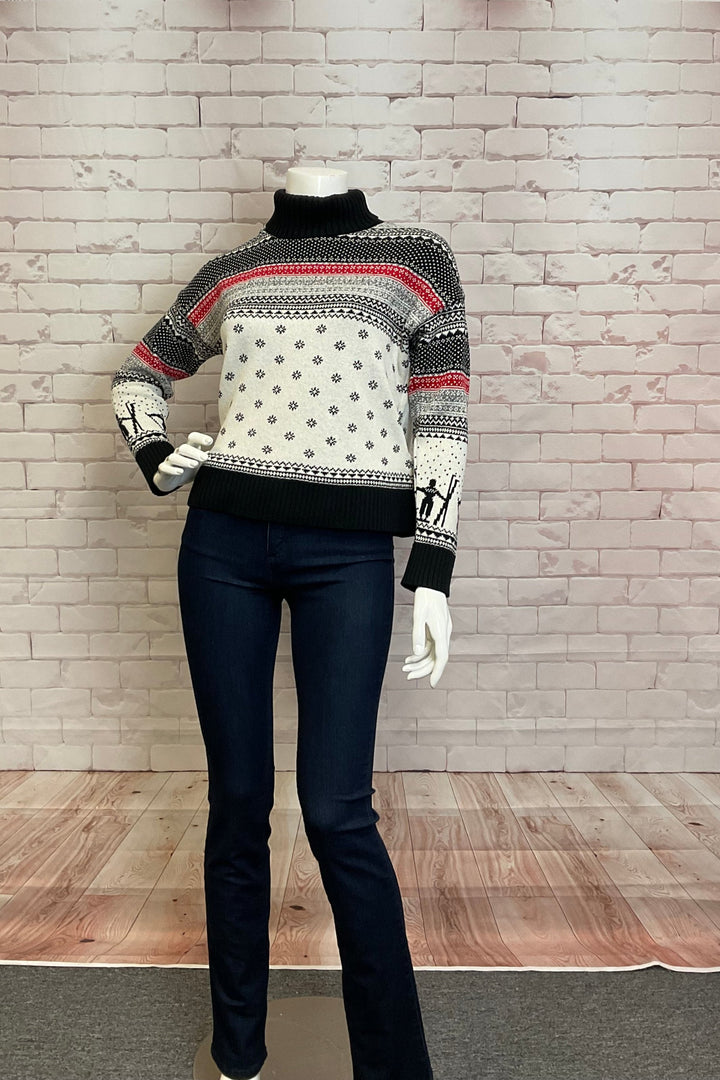 Cotton Country Fall 2024 This cozy turtleneck sweater is perfect for winter and features a festive design with lots of contrasting details.