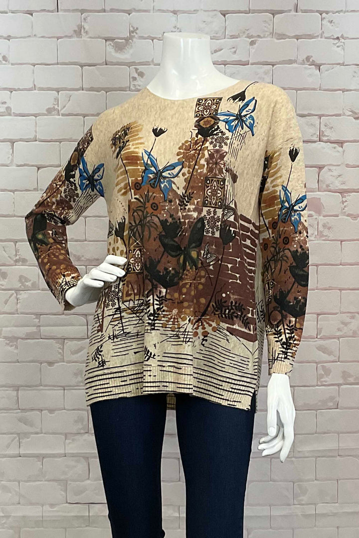 Variations Fall 2024  The round neck and slightly loose fit provide both comfort and style. Perfect for pairing with joggers, jeans or even capris, and featuring a super vivid butterfly print! 