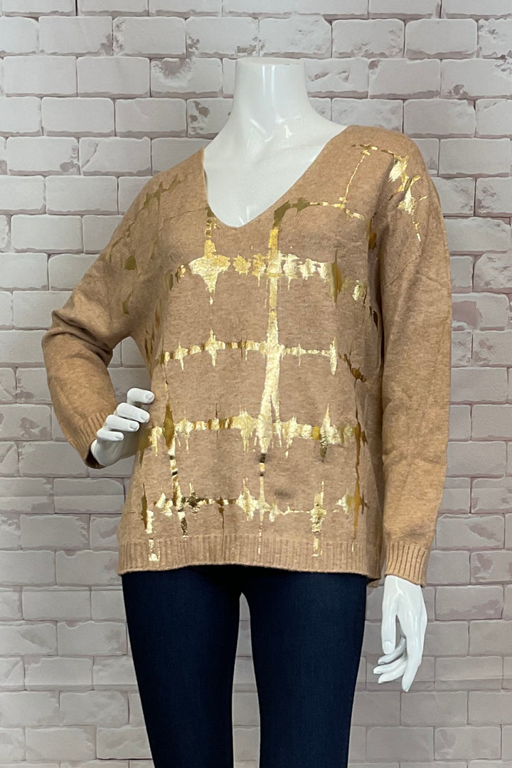 M Italy Fall 2024 The relaxed fit and light sweater material make it perfect for just about any occasion. The v-neck adds a touch of elegance, while the awesome gold foil print design on the front adds a unique and eye-catching element.
