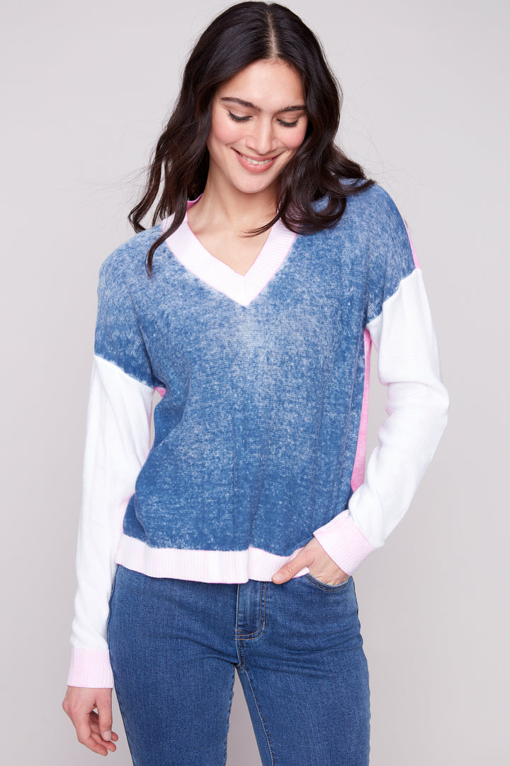 Charlie B Spring 2025 Perfect for the season, this all-cotton light sweater features blocks of fun 2-tone colour and a smart v-neck style with long sleeves.