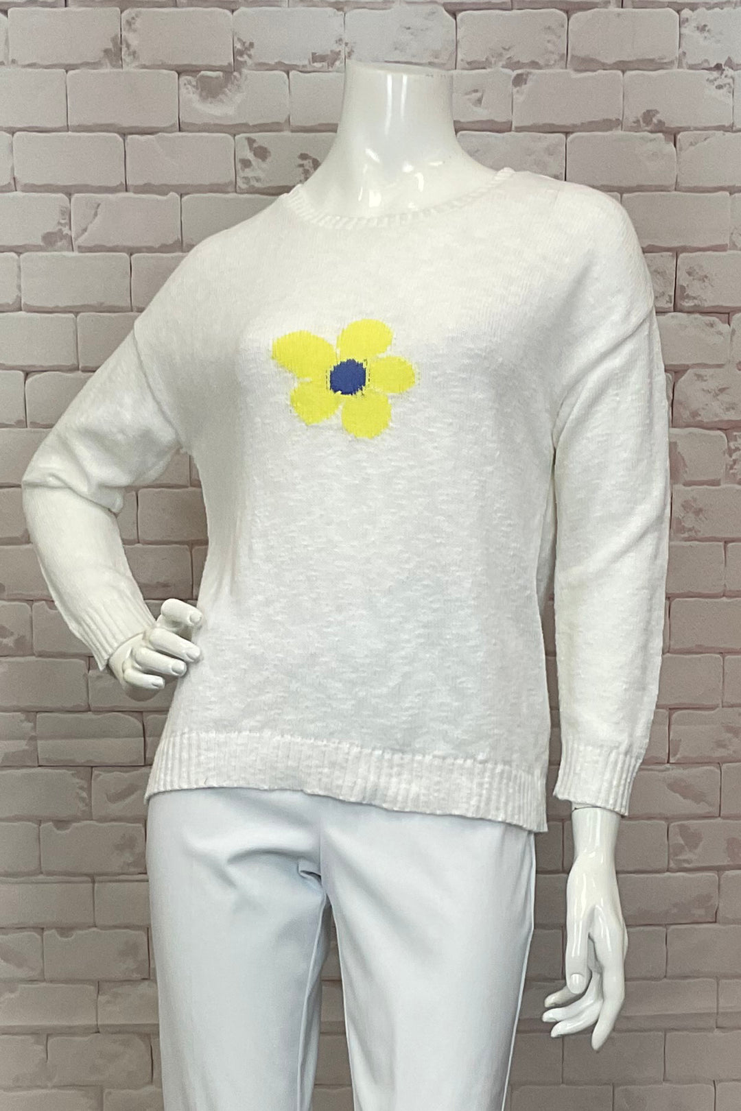 Cotton Country Spring 2025 Embrace the vintage flower power while staying cozy and stylish with the contrast neckline, cuffs, and hemline. Perfect for adding a touch of fun to any outfit this spring.