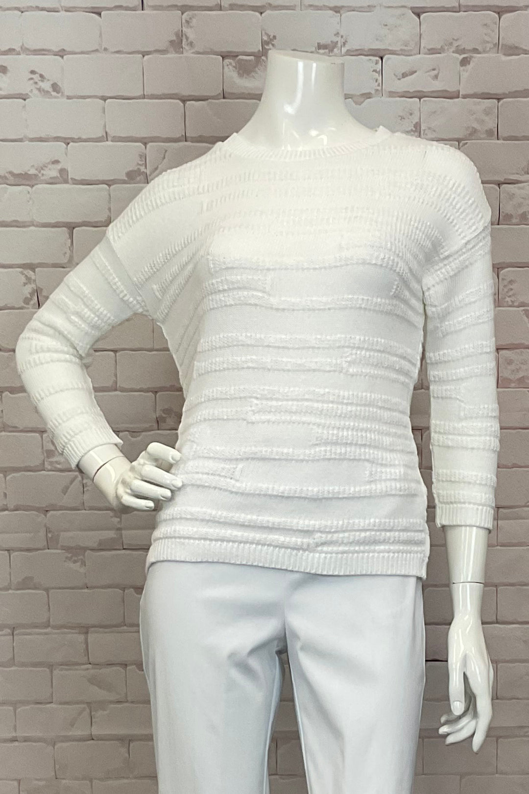 Cotton Country Spring 2025  Made of super soft, all cotton material, the relaxed fit adds to its comfort factor. The unique stripe texture pattern is accented by the contrast neck, cuffs and hemline. 