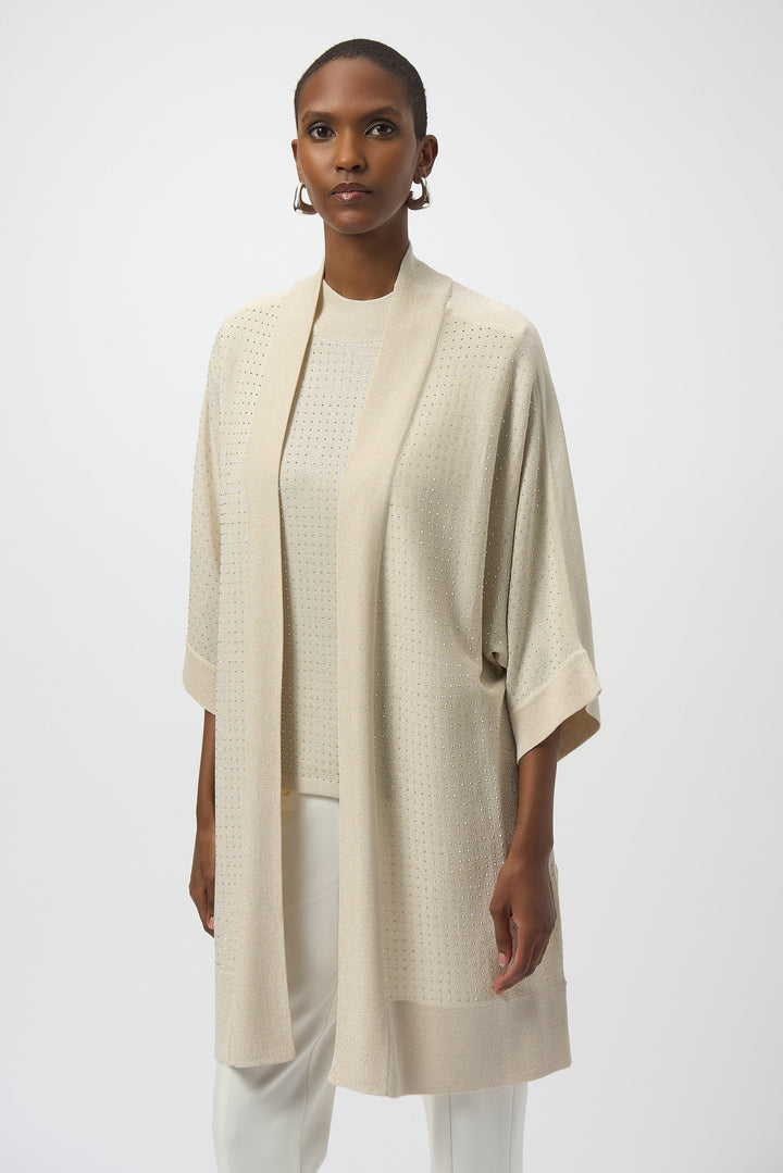 Joseph Ribkoff Fall 2025 
The lightweight, loose 3/4 sleeves and open-front design create a graceful drape, offering both comfort and elegance. Perfectly suited for casual or formal settings, this timeless cardigan combines style and versatility with ease.