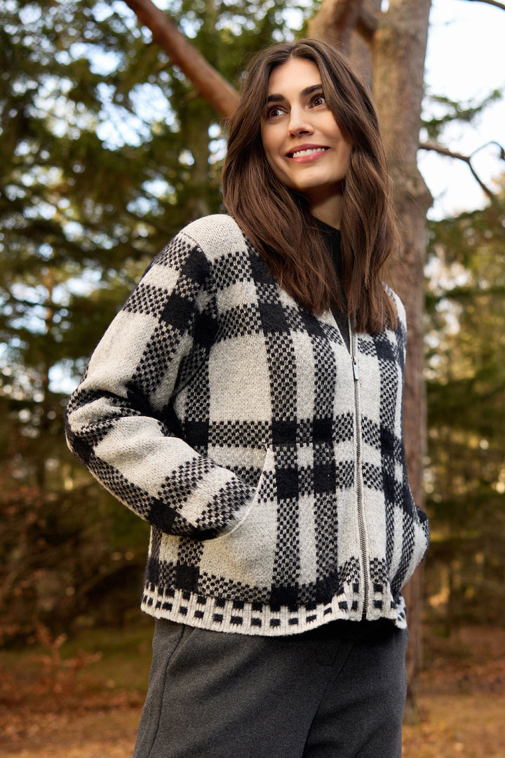 Soya Concept Fall 2025 
This plaid zipper cardigan brings a neat twist to your wardrobe with its standout plaid pattern and playful contrast cuffs and hemline.
