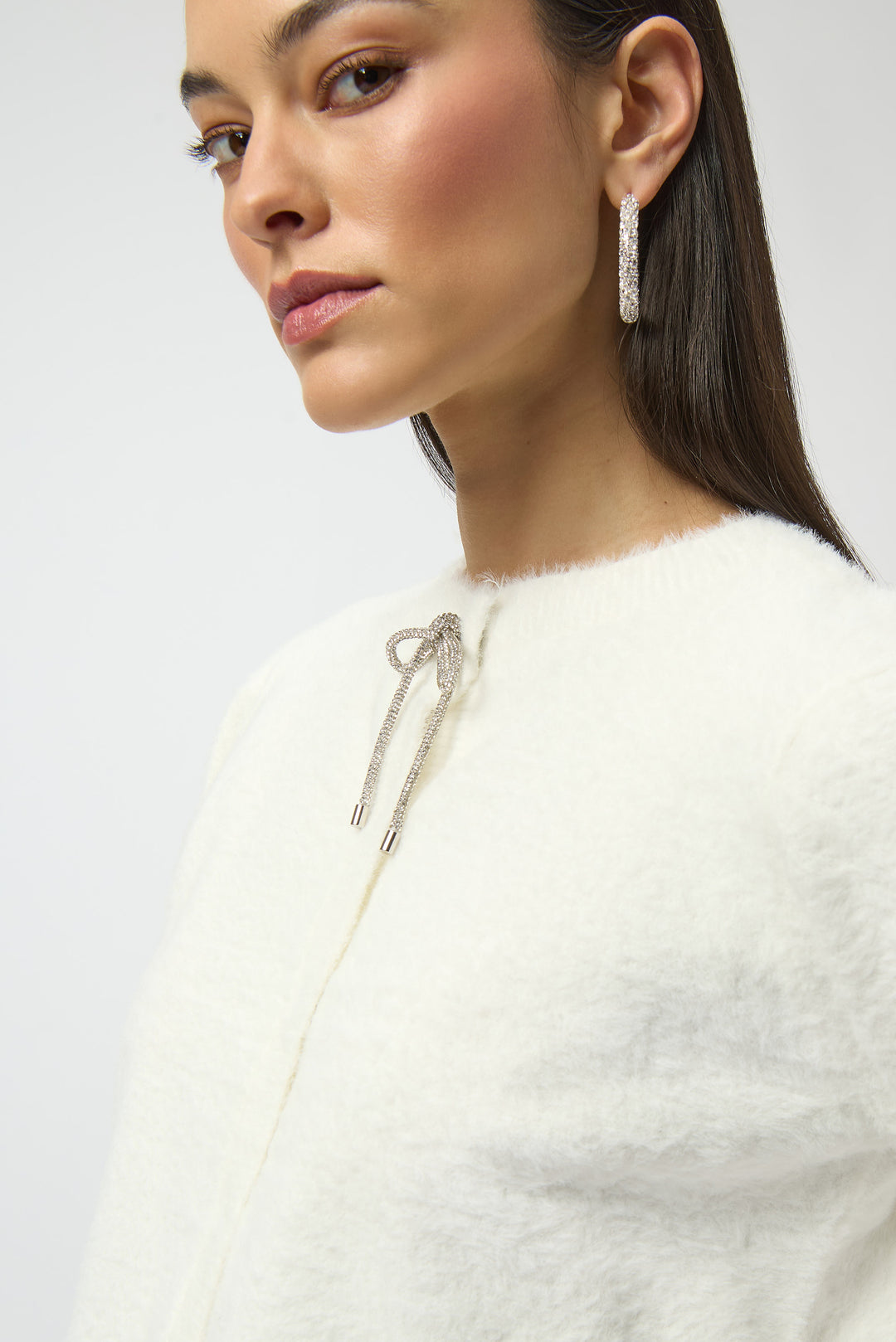 WINTER WHITE FEATHER YARN CARDI WITH RHINESTONE BOW