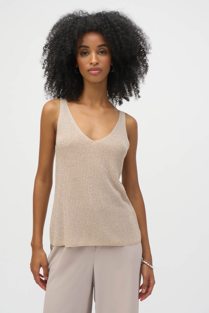 JOSEPH RIBKOFF Fall 2025  Adorned with shimmering rhinestone studs throughout, it adds a touch of refined sparkle to any outfit. Perfect for layering, wear it under a blazer for formal occasions or style it solo for a chic, casual look. 