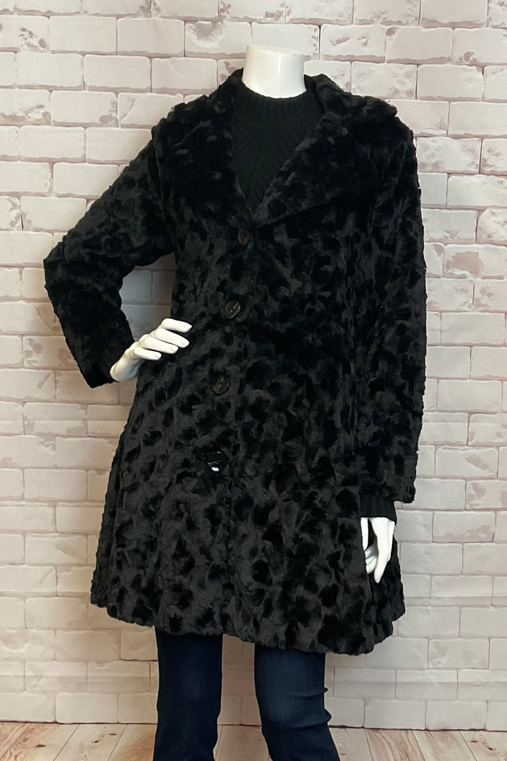 Parkhurst Fall 2024 This coat is a perfect blend of fun and elegance, featuring a wide notched collar and super lavish faux fur.