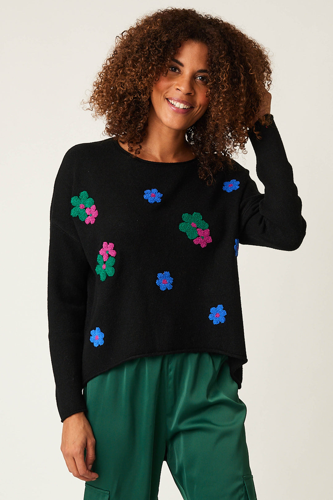 Parkhurst Fall 2024 Made from soft knit fabric, this sweater features long sleeves and drop shoulders for a comfortable fit. Adorned with embroidered flowers and decorative buttons on the back, it's both cute and lovely.