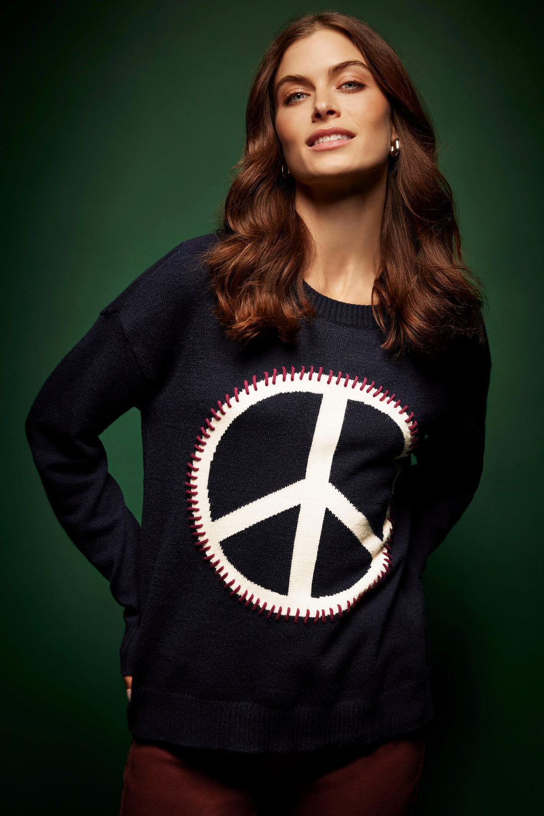 Charlie B Fall 2024 Crafted from a blend of super soft fabrics, this crew-neck sweater sports a meaningful blanket stitch peace sign graphic to express yourself in style!