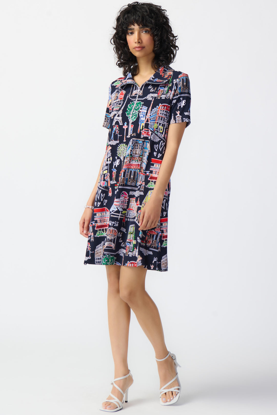 Featuring a zippered neckline and a beautiful Parisian scene, this short dress is the perfect travel companion