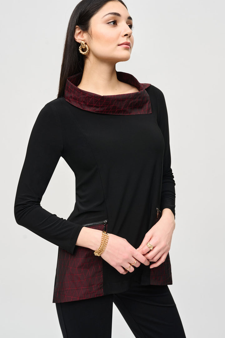 Joseph Ribkoff Fall 2024 Equipped with practical memory pockets and convenient zippers, this tunic offers both style and functionality. Perfect for any fashion-forward wardrob.