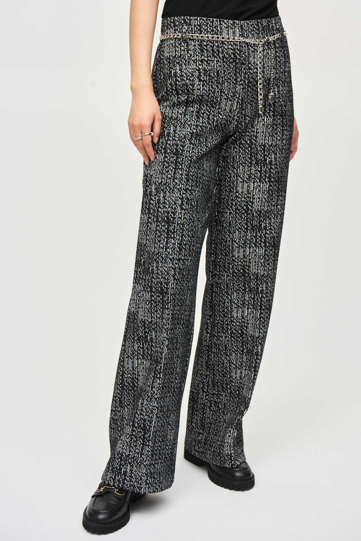 Joseph Ribkoff Fall 2024  The concealed elastic waistband ensures a comfortable and flattering high-rise fit, while the tweed knit fabric adds texture and depth. 