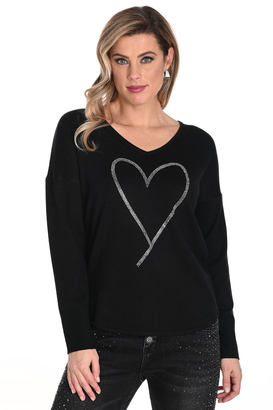 Frank Lyman Fall 2024  This cute top features a bling heart print that adds a touch of charm and playfulness! The long sleeves and flattering fit make it perfect for any occasion. 