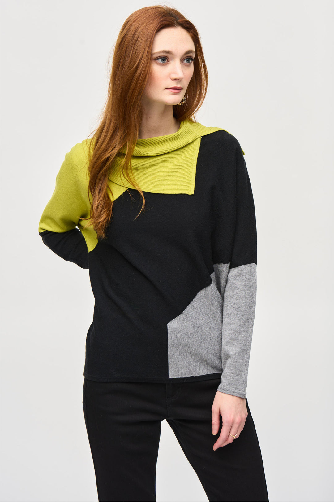 Joseph Ribkoff Fall 2024 The Colourblock Split Cowl Top from Joseph Ribkoff is a must-have for the cooler seasons. It’s made in Canada with cozy knit fabric, and features a cowl neck and long straight sleeves for extra warmth.