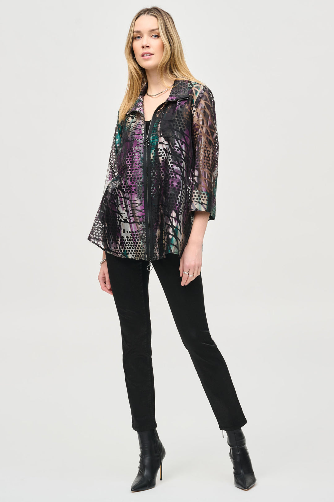 Joseph Ribkoff Fall 2024  This slim fit jean combines traditional denim elements with a trendy foiled print for a versatile look. Made with a comfortable cotton blend, it can be dressed up or down for any occasion. 