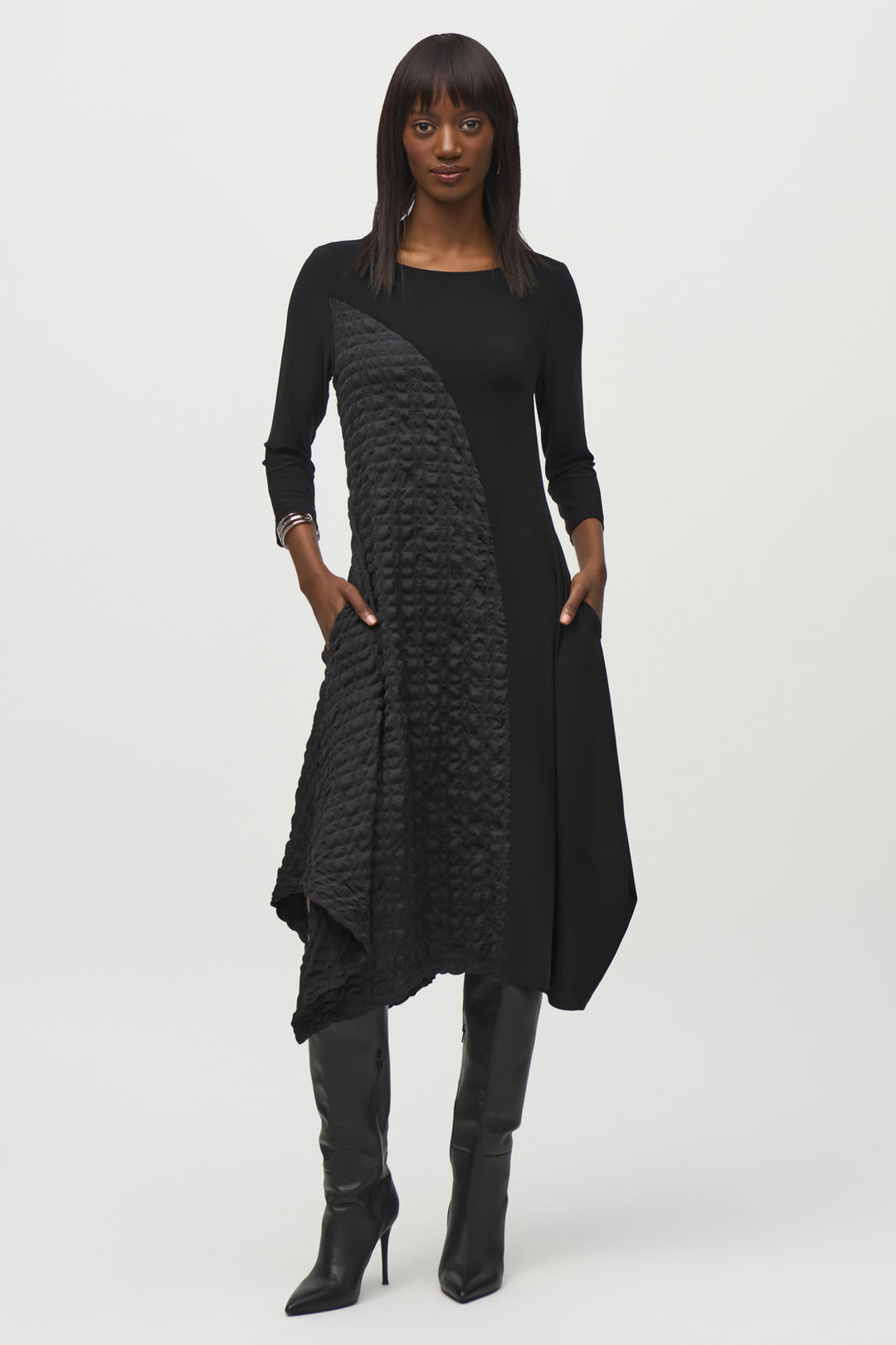 Joseph Ribkoff Fall 2024 The round neck style and 3/4 sleeves add a touch of elegance. The lovely handkerchief hem with bubble texture completes the ensemble for a chic and memorable outfit.