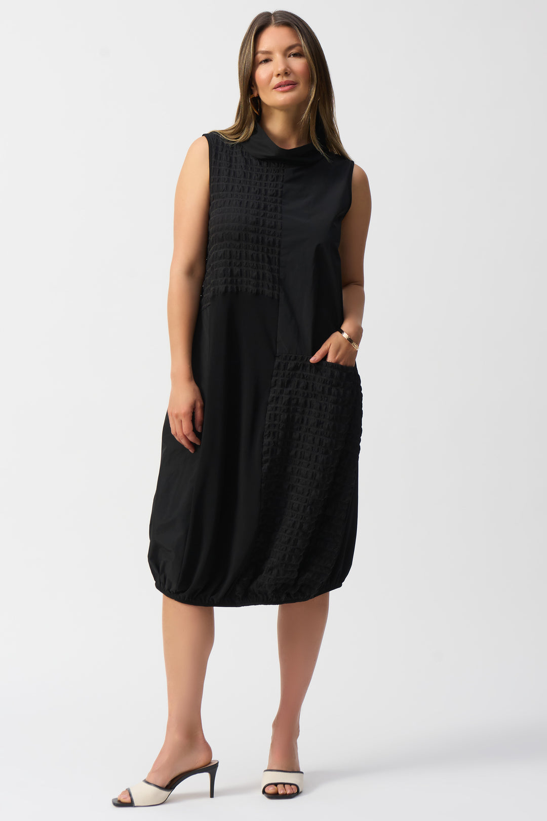 Joseph Ribkoff Spring 2025 Made with contrast patch bubble texture and memory fabric, it's both stylish and comfortable. Experience the perfect mix of style and comfort with our Bubble Textured & Memory Cocoon Dress.